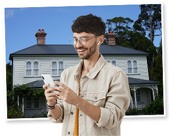 Homeowner checking his equity on his phone outside his house